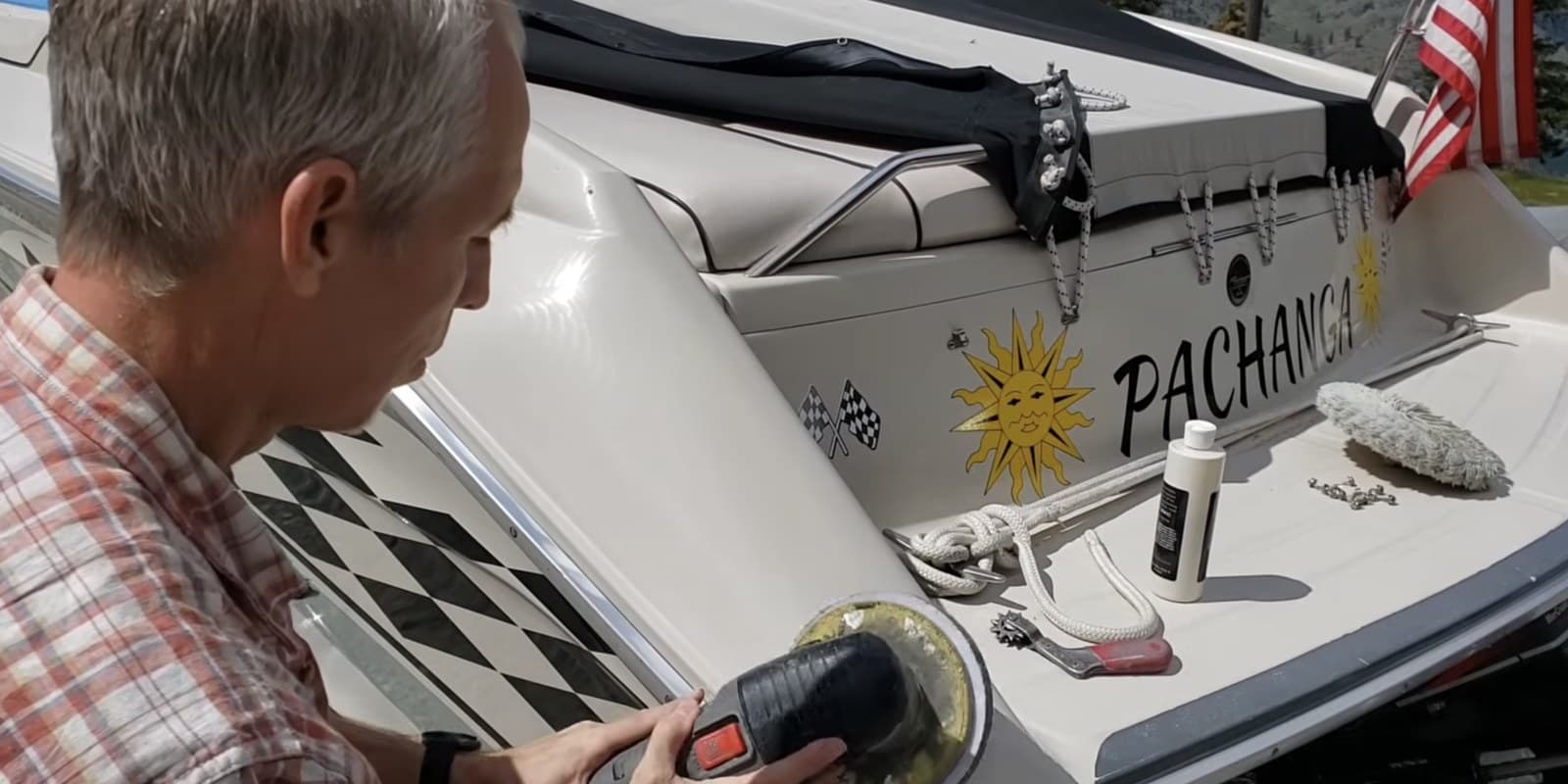 Lee applying T'sillan BDG to a Sea Ray Pachanga at Lake Chelan